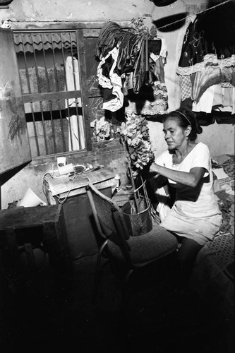 Woman making a headdress, Barranquilla, Colombia, 1977