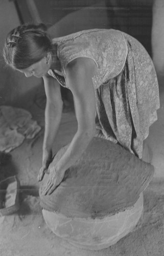 A woman making pottery, La Chamba, Colombia, 1975