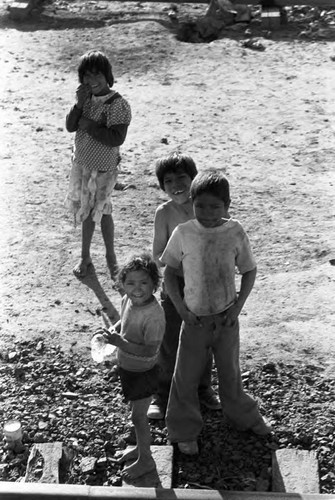 Children near the train tracks, Mexico, 1983