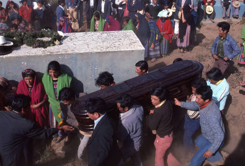 Men carrying a coffin to the cemetery, Patzún, 1982