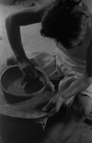 A woman making pottery, La Chamba, Colombia, 1975