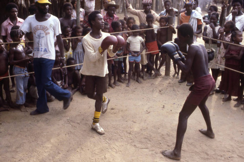 Men boxing inside boxing ring, San Basilio de Palenque, 1976