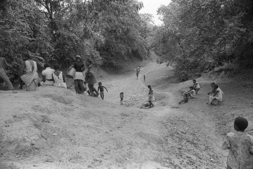 Women and girls collecting water at the river, San Basilio de Palenque, 1976