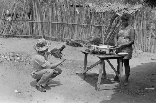 A photographer records villager, San Basilio de Palenque, 1977