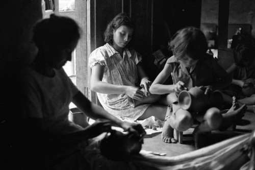 Women making pottery, La Chamba, Colombia, 1975