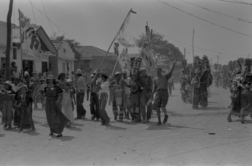 Dancers walking to the Carnival, Barranquilla, Colombia, 1977