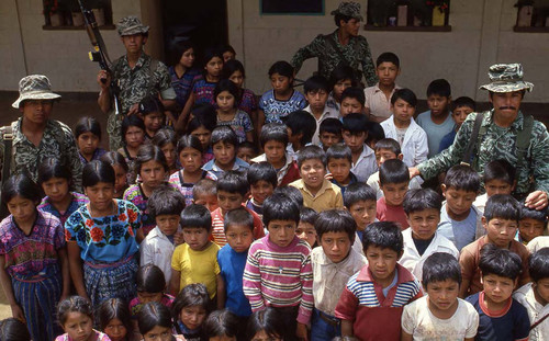 School children stand surrounded by four soldiers, Zaragoza, 1982