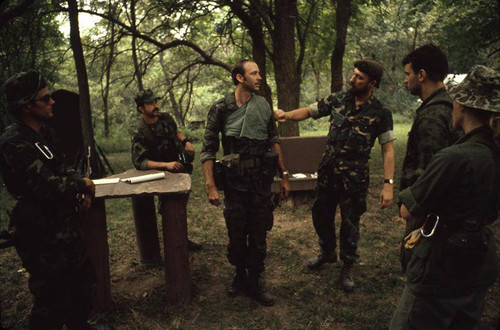 Survival school students learn first aid techniques, Liberal, 1982