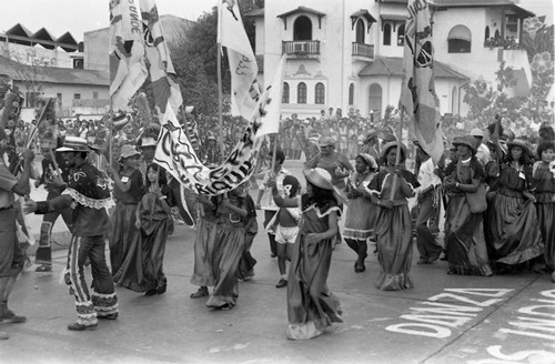 El Congo Grande de Barranquilla, dancers walking in the street, Barranquilla, Colombia, 1977