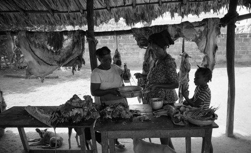 Women selling and buying meat, San Basilio de Palenque, 1976