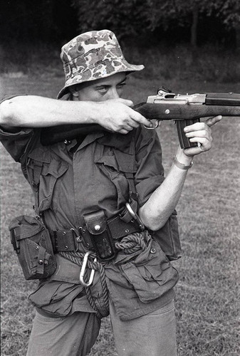 Survival school student holds a gun, Liberal, 1982