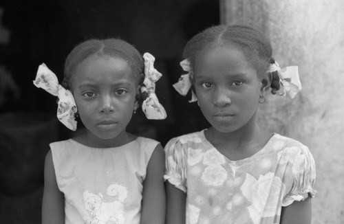 Two girls posing for a portrait, San Basilio de Palenque, 1976