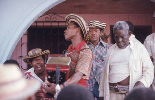 Musicians playing and singing in the streets, San Basilio de Palenque, 1976