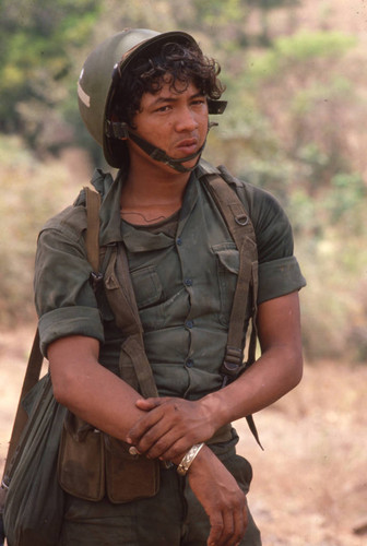 Soldier standing and resting, San Antonio de los Ranchos, Chalatenango, El Salvador, 1981