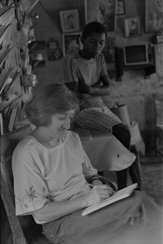 Nina S. de Friedemann taking notes, San Basilio del Palenque, ca. 1978