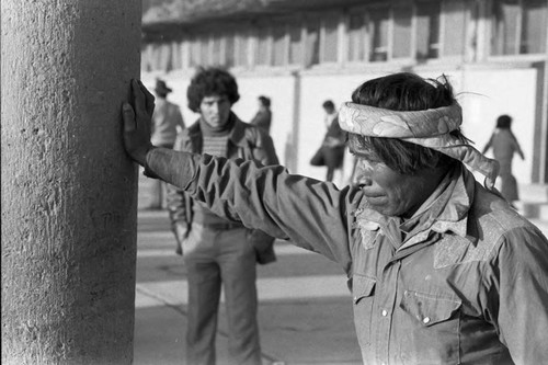 Rarámuri or Tarahumara indigenous man waits for a train, Cuidad Juarez, 1983