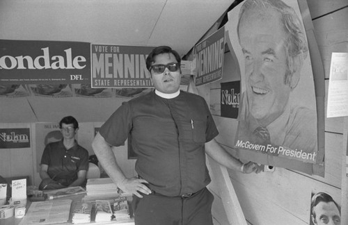 Clergyman and campaign posters, 1972