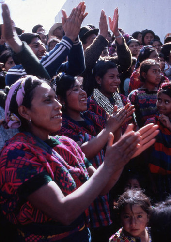 Mayan women and men celebrating at a campaign rally for presidential candidate Ángel Aníbal Guevara, Ciudad Vieja, 1982