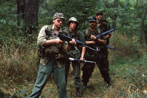 Survival school students participate in an obstacle course, Liberal, 1982