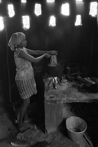 Woman cooking a turtle, San Basilio de Palenque, 1977