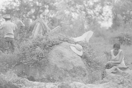 Woman extracting clay, La Chamba, Colombia, 1975