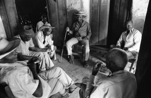 Men gather, San Basilio de Palenque, Colombia, 1977