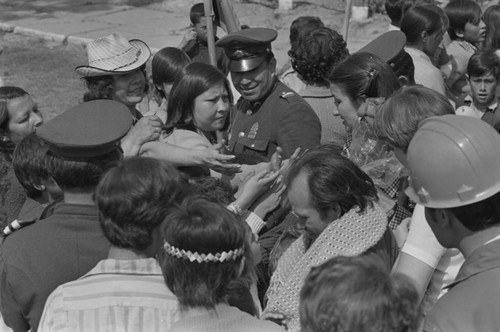 Officers amongst a crowd, Tunjuelito, Colombia, 1977