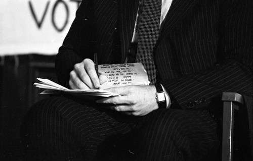 Ted Kennedy writes notes, Philadelphia, 1980