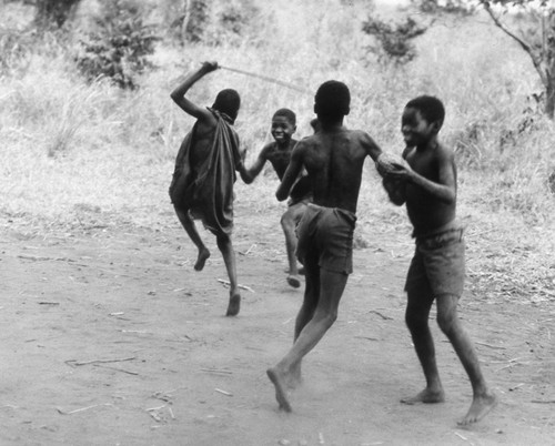 Boys playing outdoors, Tanzania, 1979