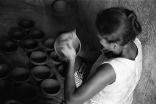 Artisan at work, La Chamba, Colombia, 1975