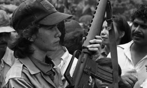 Sandinista woman in a crowd, Managua, 1979