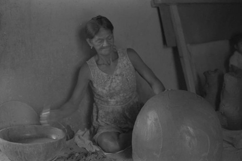 A woman making pottery, La Chamba, Colombia, 1975