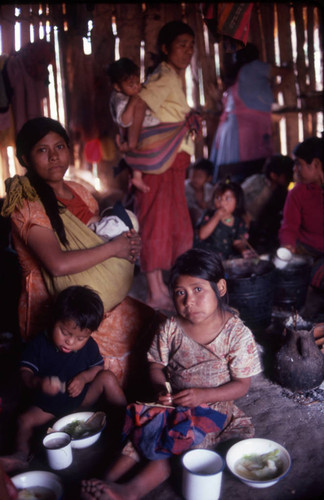 Guatemalan refugees eating, Cuauhtémoc, 1983