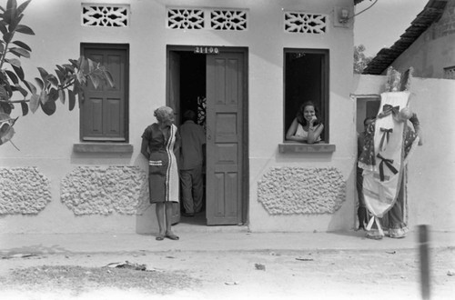 Women watching Carnival activities, Barranquilla, Colombia, 1977