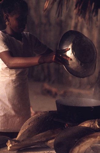 Woman cooking next to a stove, San Basilio de Palenque, 1976