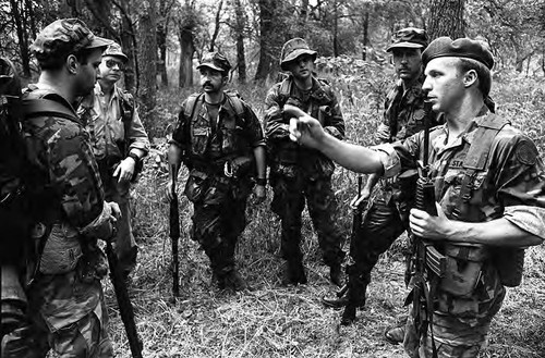 Survival school students await instructions, Liberal, 1982