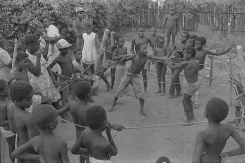 Children boxing inside ring, San Basilio del Palenque, ca. 1978