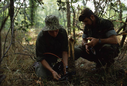 Survival school student learns about explosives, Liberal, 1982