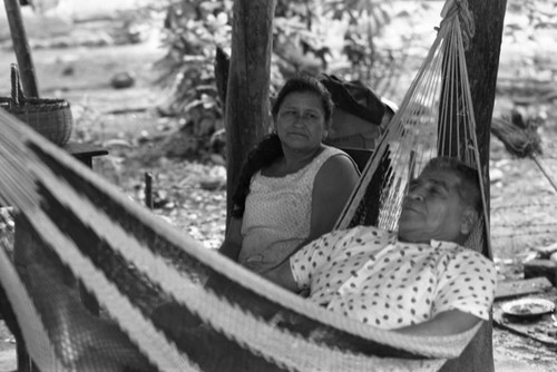 Woman and children sitting outside, La Chamba, Colombia, 1975