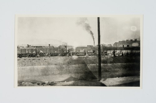 Soldiers at Railyard: View of Train