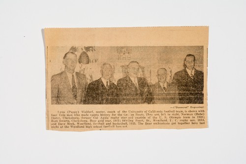 Clipping, Lynn (Pappy) Waldorf, center, coach of the University of California football team, is shown with four Yolo men who made sports history for the Golden Bears