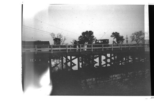 Bridge with people and automobile