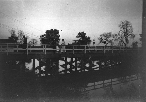 Bridge with people and automobile