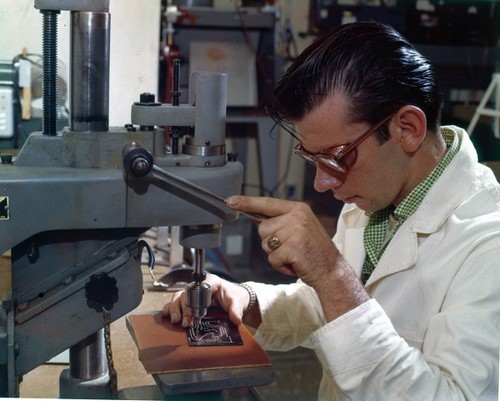 PictionID:42922335 - Catalog:14_002898 - Title:Circuitboard Assembly Details: Printed Circuit Lab; Drilling holes in board Date: 05/11/1959