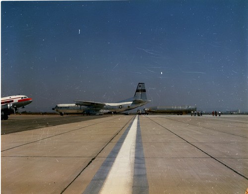 PictionID:43328372 - Catalog:14_004960 - Title:Atlas Details: Missile Loading into C-133A at NAS Miramar Date: 09/19/1958 - Filename:14_004960.TIF