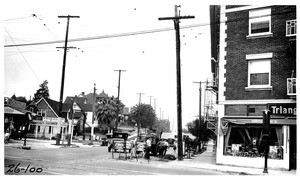 Looking north on Hoover from Venice Boulevard showing unsurfaced trench of L.A. Gas Company, Los Angeles, 1926