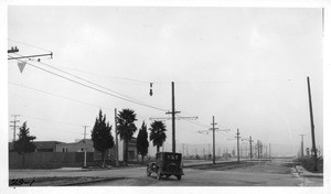 Looking southwesterly at Santa Barbara Avenue and 3rd Avenue showing Los Angeles Railway crossing, Los Angeles, 1929