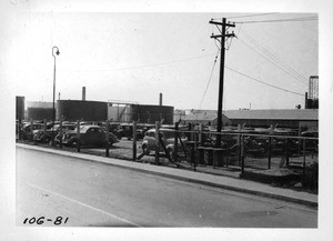 Workmen's automobiles parked at oil refinery on Sepulveda Boulevard, Wilmington, Los Angeles, 1938