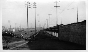 Viaduct over Pico Boulevard at San Vicente from point just west of Longwood Avenue in north roadway of San Vicente Boulevard near west end of viaduct looking southeast along viaduct, Los Angeles, 1927