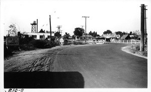 Dangerous curve in Downey-Norwalk Road at south entrance to Norwalk, Los Angeles County, 1923